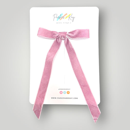 Lilac velvet long tail hair bow on a Parker & Kay branded card