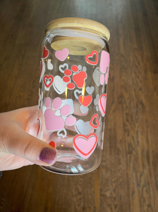 Glass can with wood lid and red and pink heart-shaped paws design